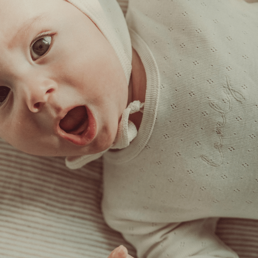 The Pointelle Romper & Bonnet - Oatmilk